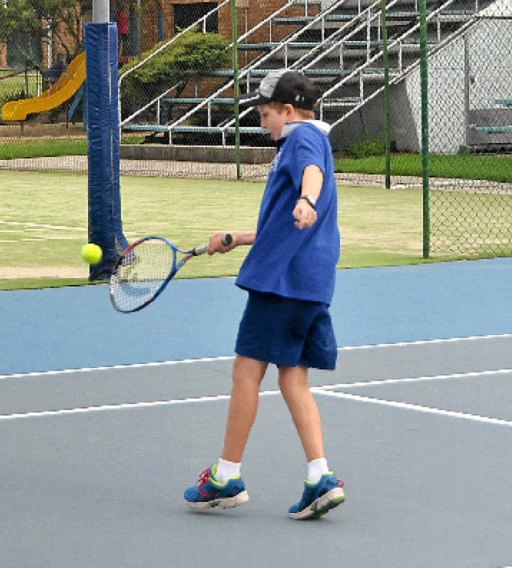 Matthew Strom hits a forehand during training.